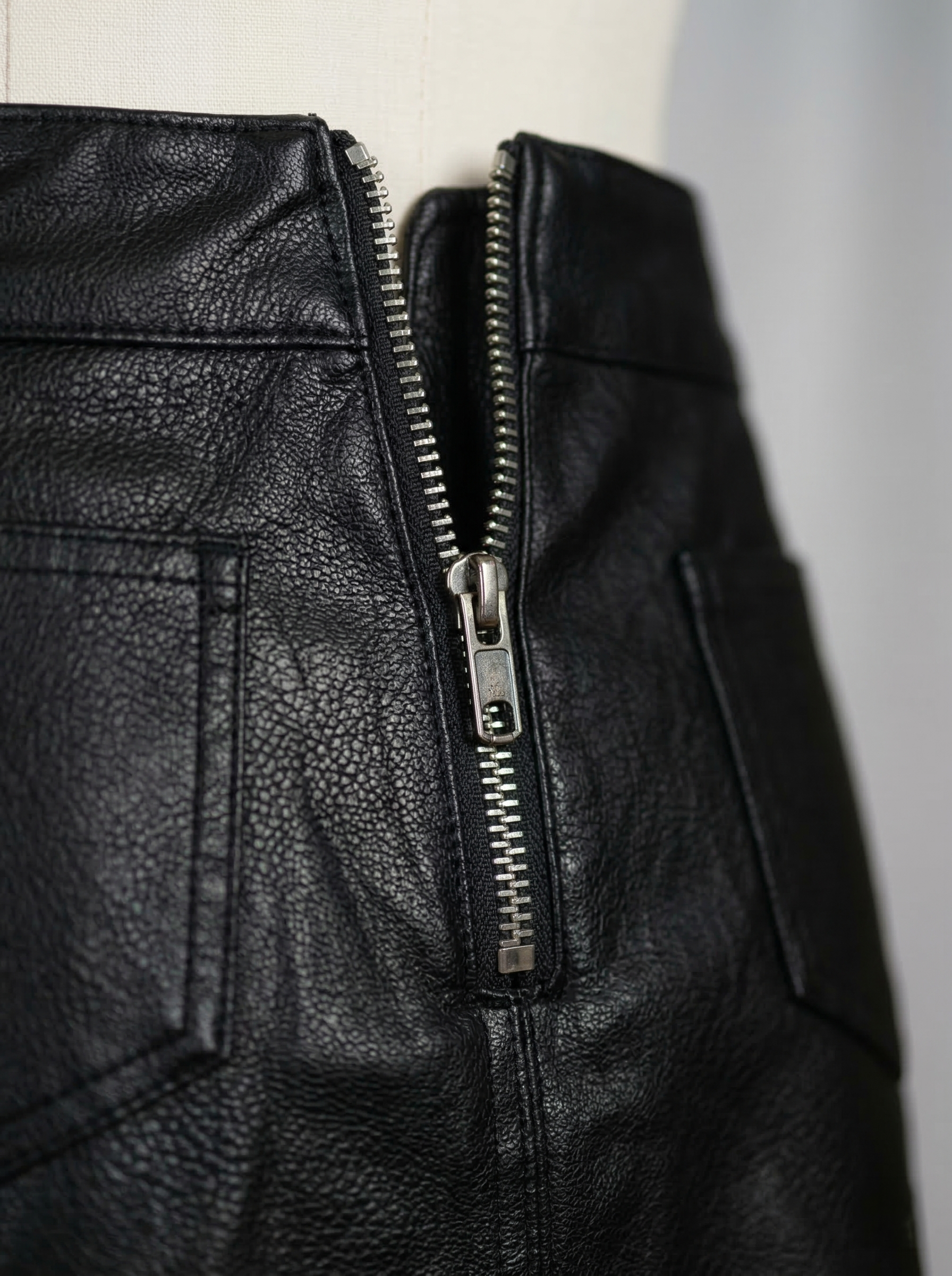 The Lior Belted Vegan Leather Skirt